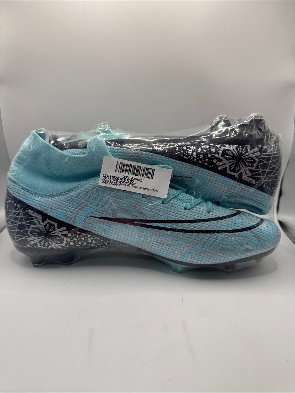 Light Blue Women's Soccer Cleats with Black Accents
